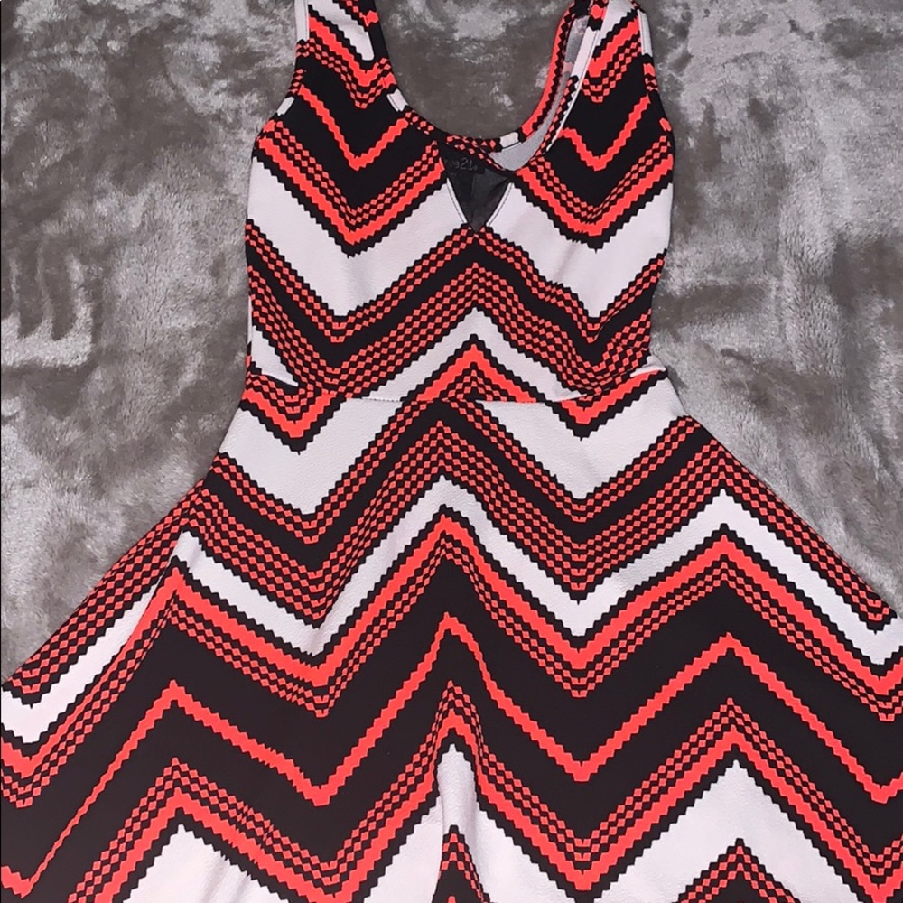 A cute white black and peach dress.